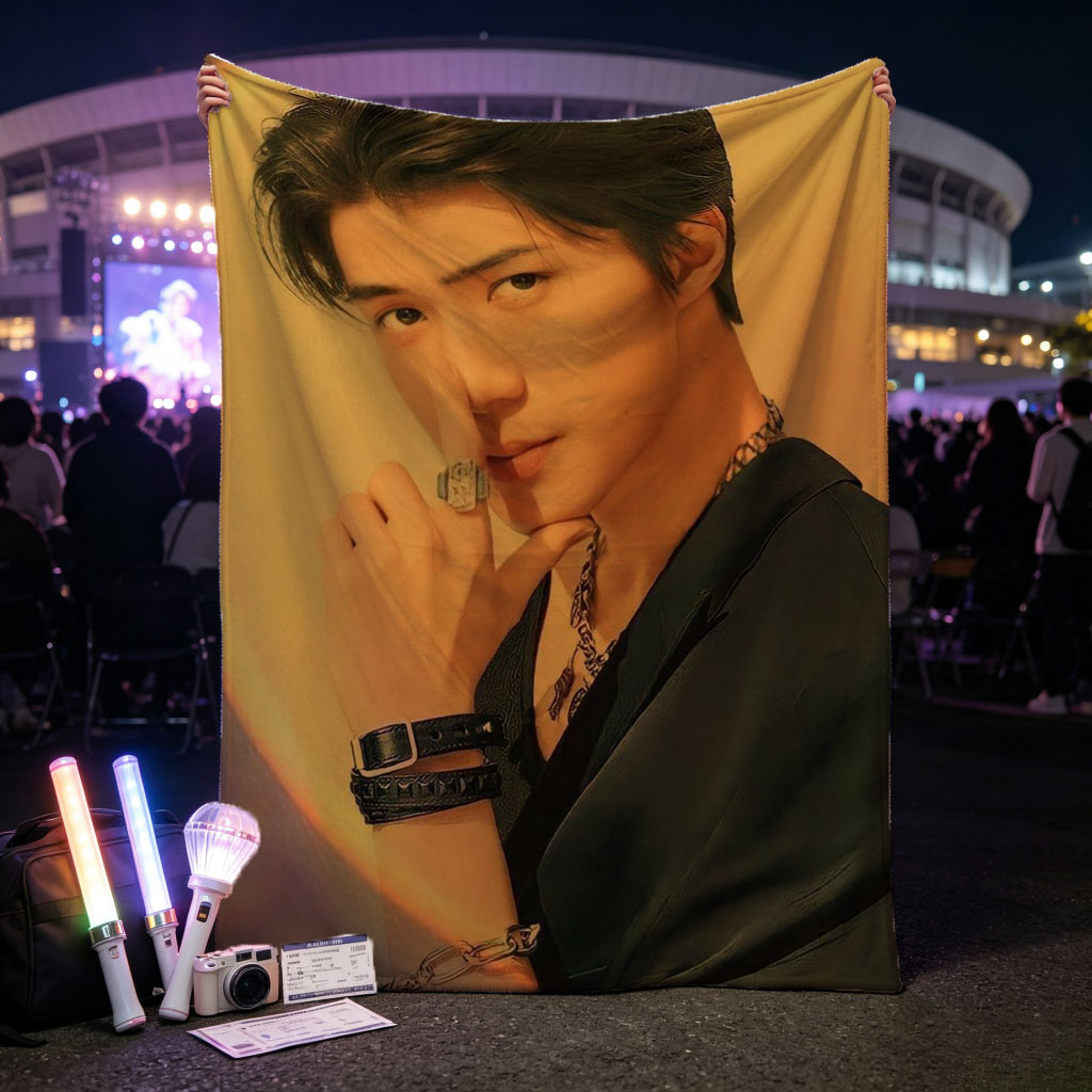 Felix from Stray Kids in a Stylish Pose with Dramatic Lighting and Fashion Accessories - Blankets