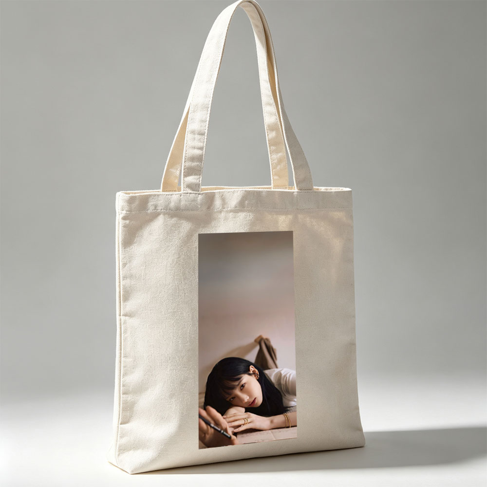 Kim Min-ji Lying on Floor Holding Pen in Soft Lighting Portrait - Canvas tote bags