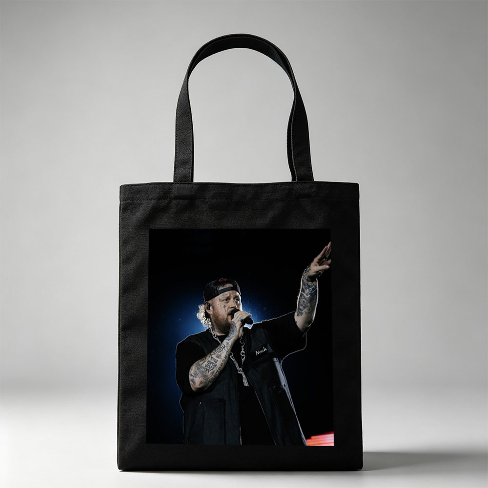 Jelly Roll Performing on Stage with Microphone and Tattooed Arms - Canvas tote bags