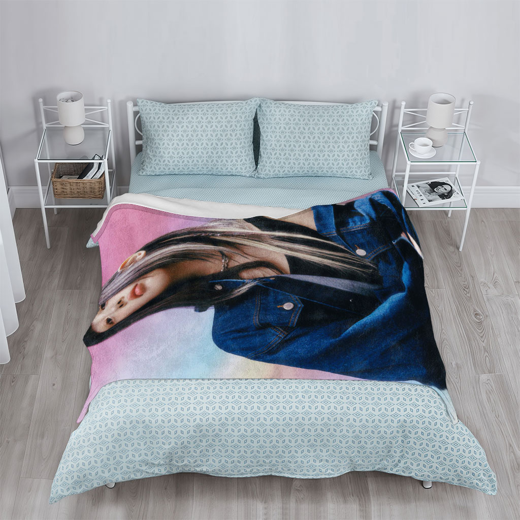 Hanni from NewJeans in a Stylish Denim Look Against a Vibrant Gradient Background - Blankets