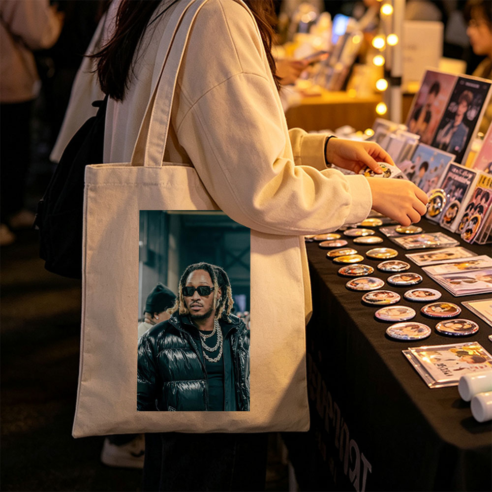 Tory Lanez at a Music Event Wearing a Black Puffer Jacket and Sunglasses - Canvas tote bags