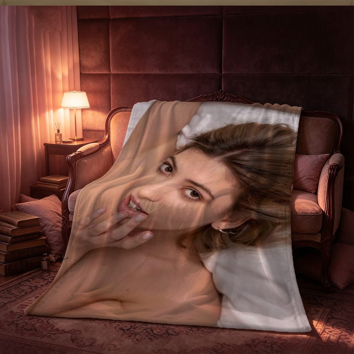 A woman in a grey bodysuit sitting on a bed. - Blanket
