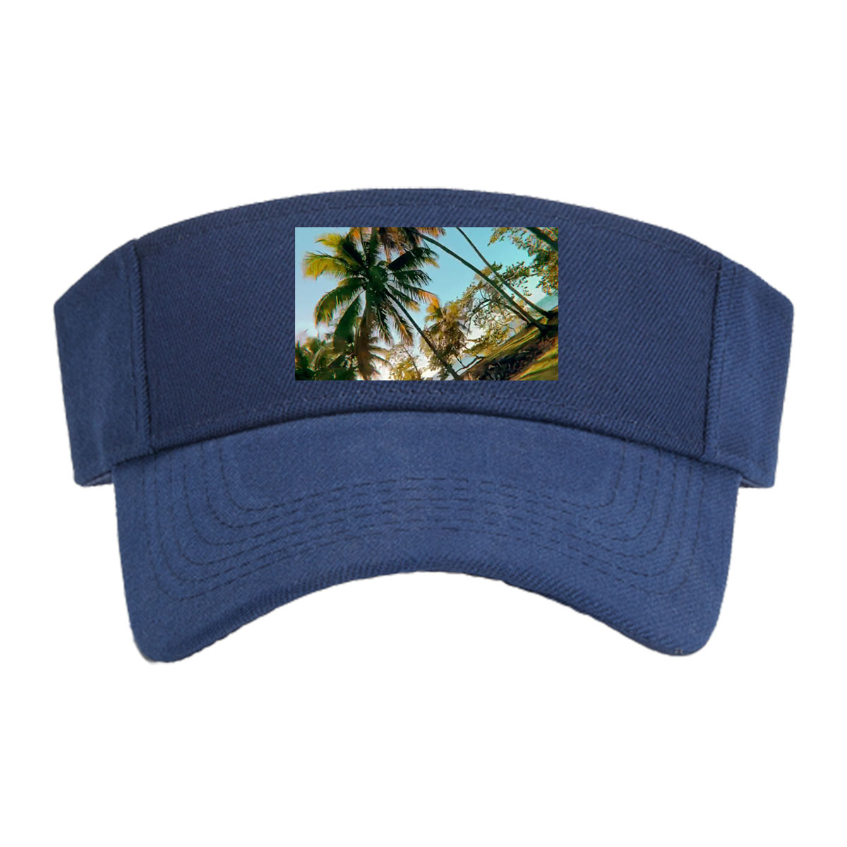 Tropical palm trees sway under a clear blue sky, casting golden shadows on the ground. -  Visor cap