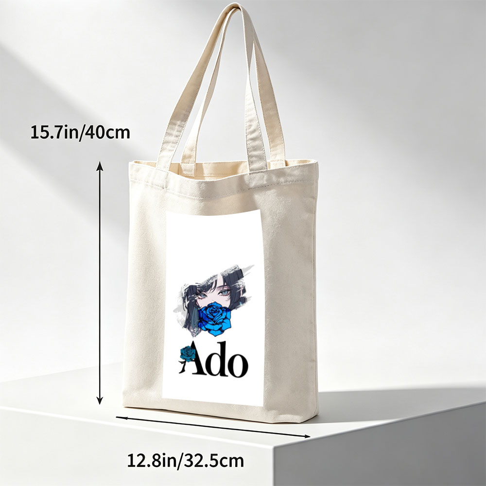 Ado in a Dramatic Portrait with Blue Rose Covering Her Mouth - Canvas tote bags