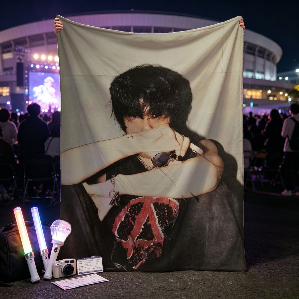 Hyunjin of Stray Kids in a Moody Pose with Sunglasses and Cross Tattoo, Wearing a Black T-Shirt with Red Peace Symbol Design - Blankets