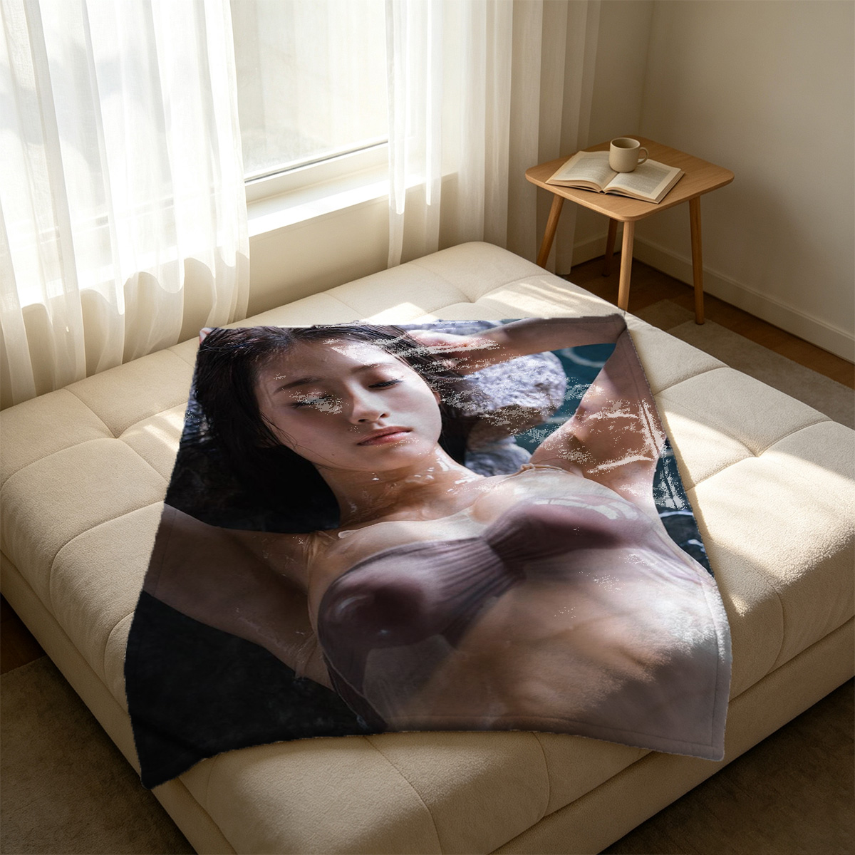 Two Elegant Women in Chic Outfits Posing on a Pink Sofa - Blanket