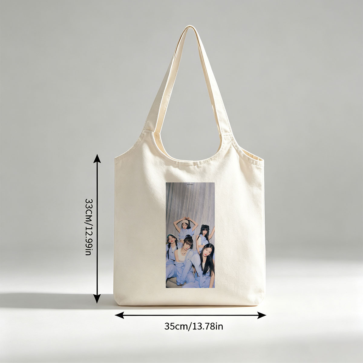 NewJeans Group Photo in Coordinated Blue Outfits Posing Together Against Gray Backdrop - Canvas shoulder bags/