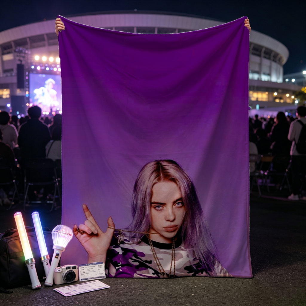 Billie Eilish in Purple Camo Outfit Making Hand Gesture Against Vibrant Background - Blankets