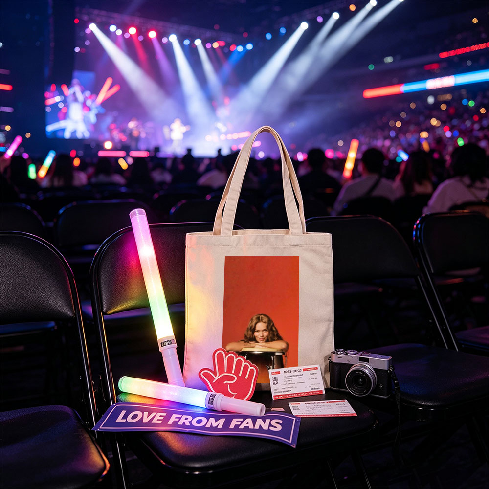 Rita Ora Leaning on a Drum Against a Red Background - Canvas tote bags