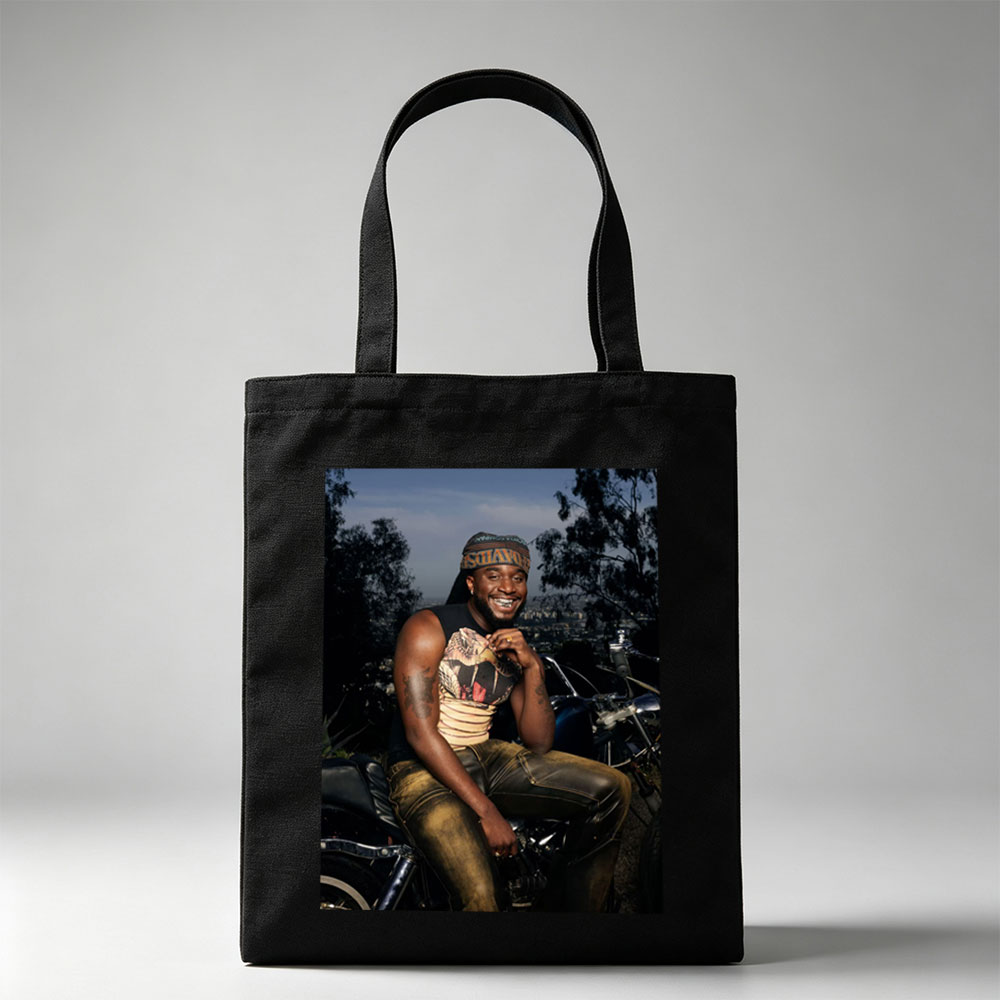 Terry Crews on Motorcycle with City View in Background - Canvas tote bags