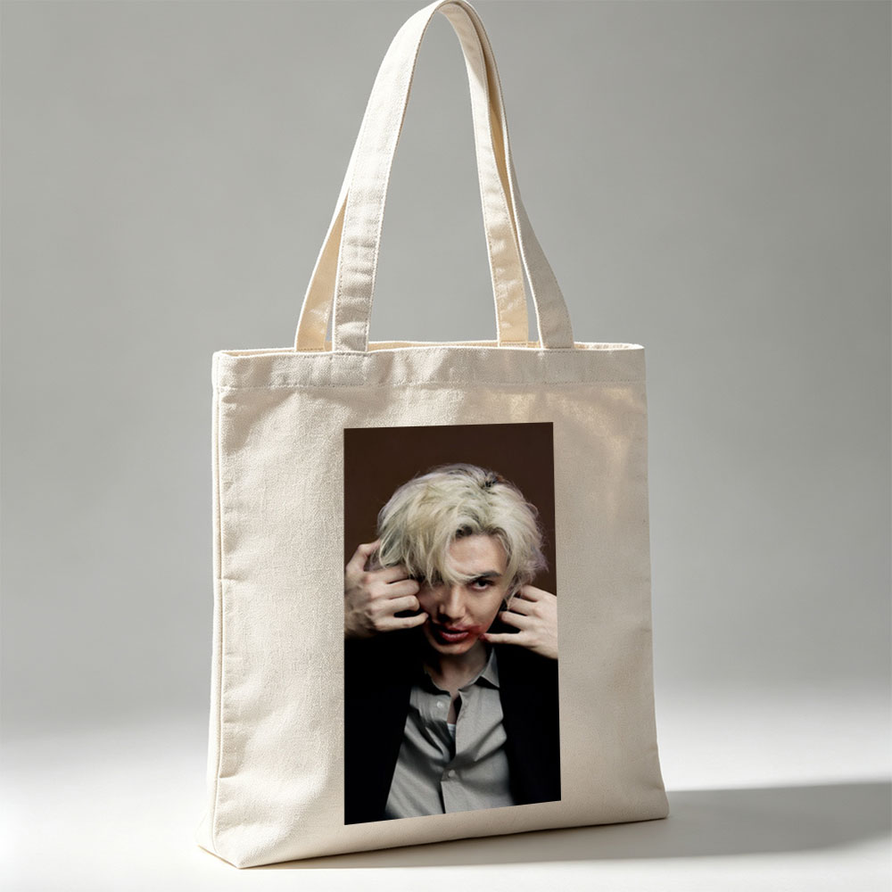 Lisa from BLACKPINK in a Dramatic Close-Up with Platinum Blonde Hair and Intense Expression - Canvas tote bags