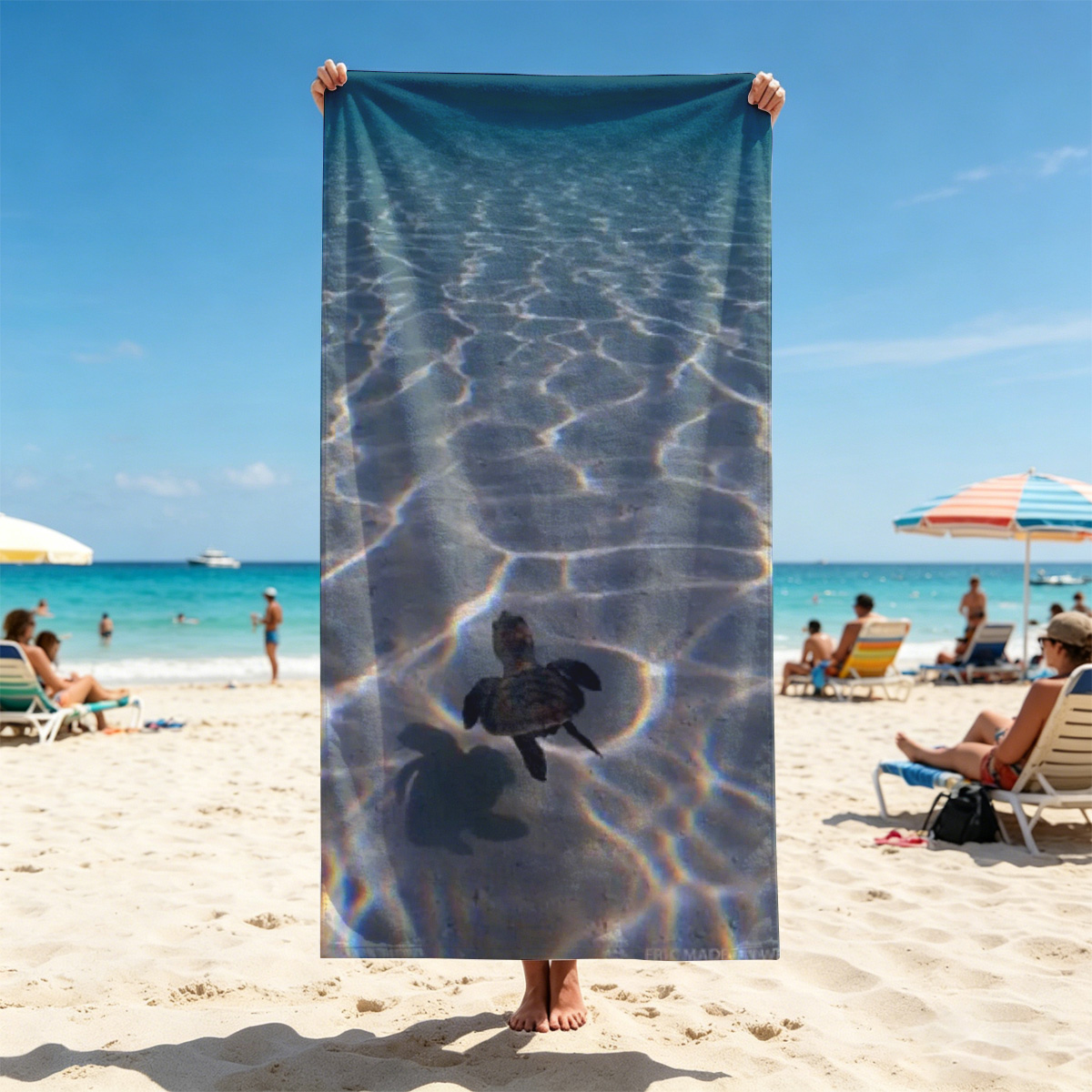 Sea turtle swimming over sandy ocean floor with sunlit ripples - Beach towels