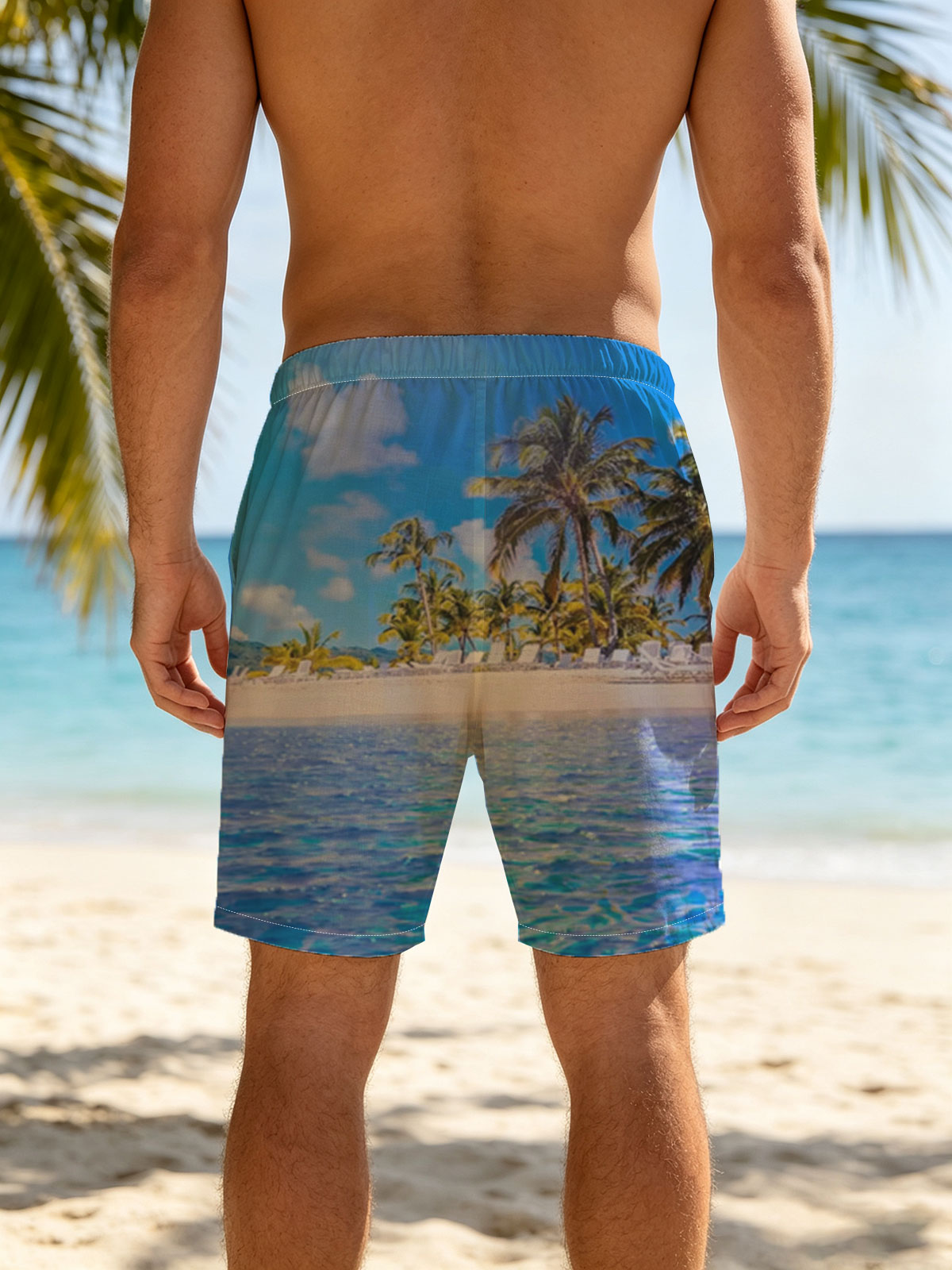 Sunny beach with palm trees and clear blue water -  Beach shorts