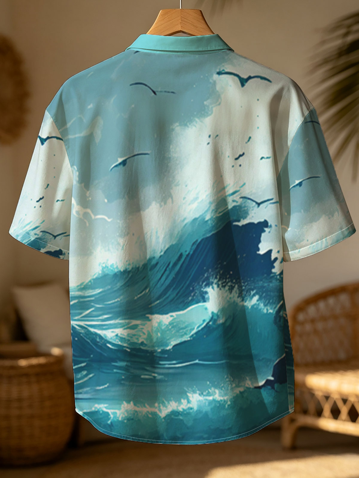Mighty waves crash against rocks as seagulls soar above the stormy sea. -  Shirt