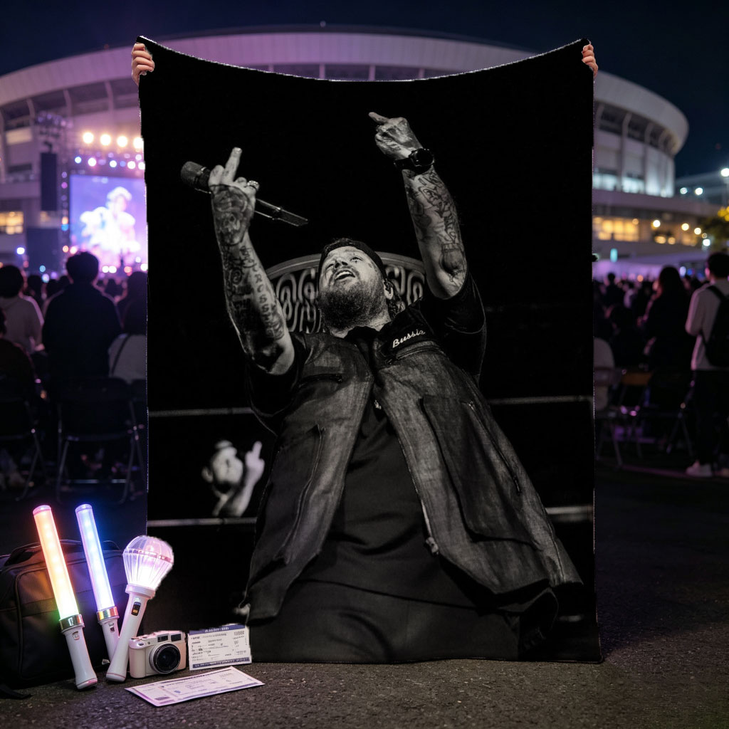 Luke Combs Performing on Stage with Tattooed Arms Raised in Black and White Photo - Blankets