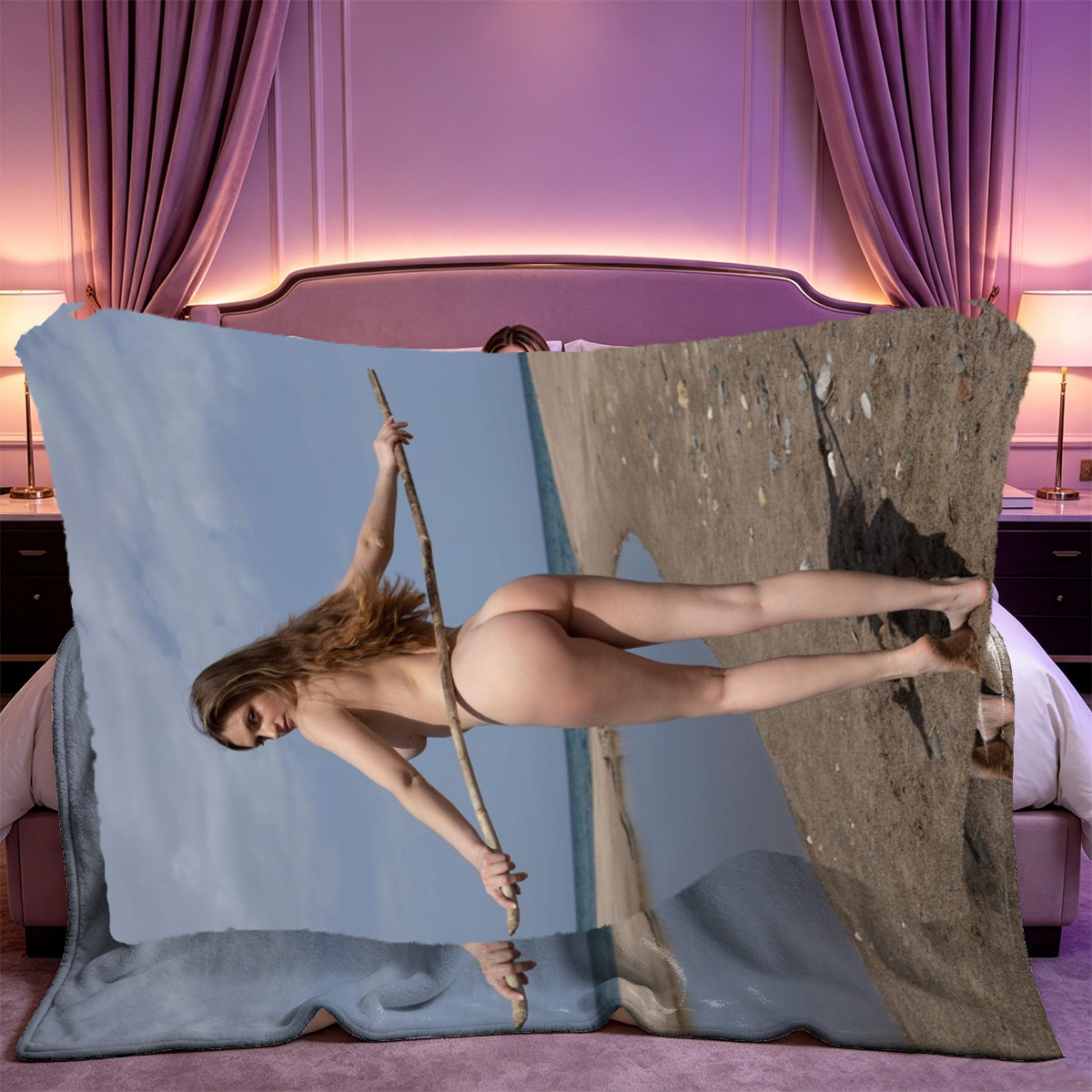 A woman in pink lace lingerie pulling down her bra straps in a bedroom. - Blanket