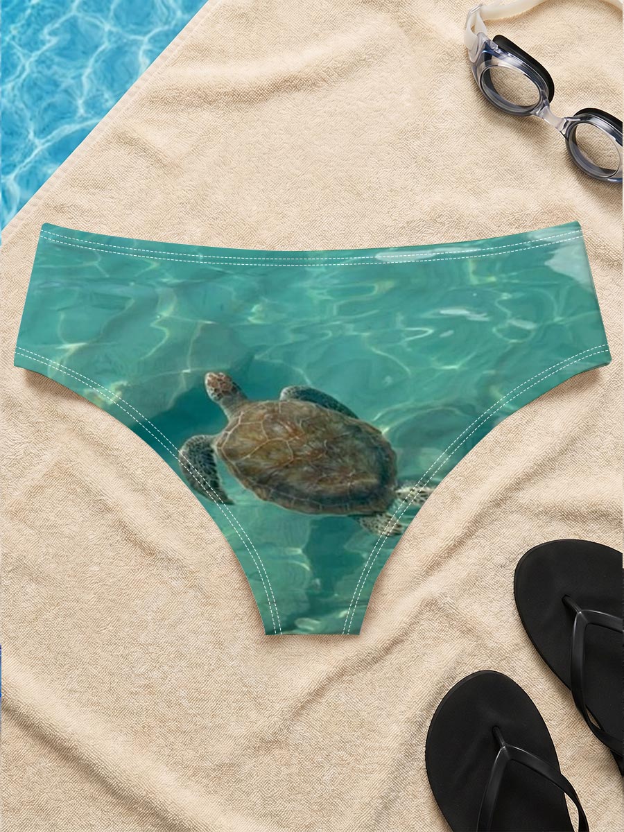 Sea turtle swimming in clear turquoise water -  Men's swim trunks