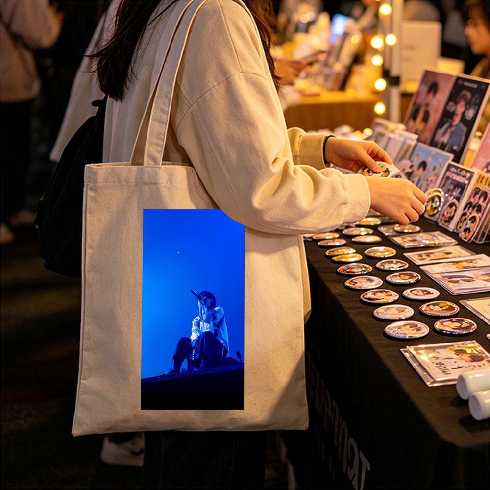 Troye Sivan Performing on Stage Under Blue Lighting - Canvas tote bags