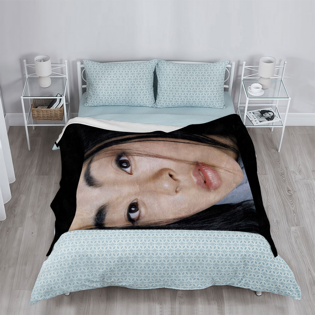 Yuki Kajiura in a Close-Up Portrait with Soft Lighting and Gentle Expression - Blankets