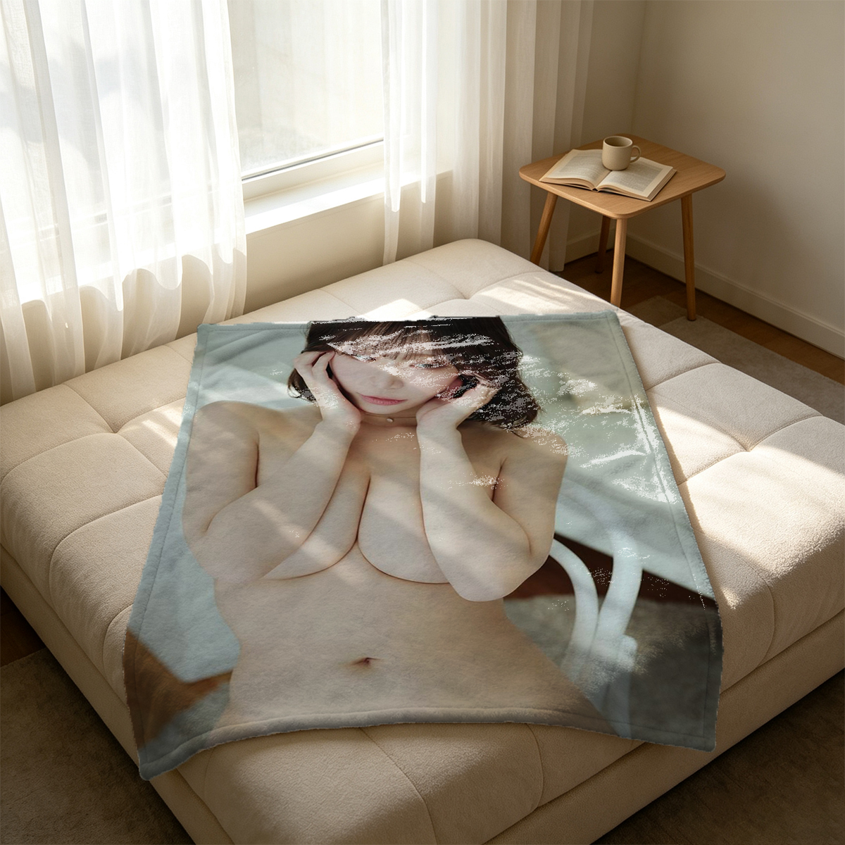 Nude woman with long brown hair posing on a couch, looking back over her shoulder. - Blanket