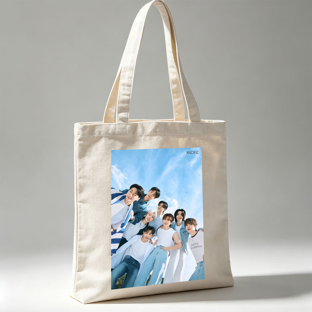 NACIFIC Band Members in Casual Outfits Posed Against a Bright Blue Sky - Canvas tote bags