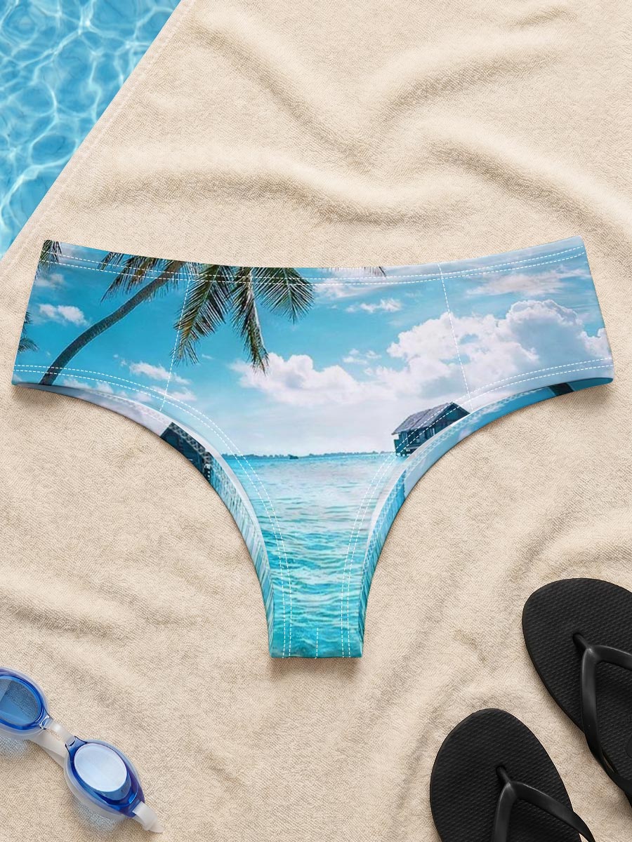 Tropical paradise with palm trees and overwater bungalows in crystal clear blue waters. -  Men's swim trunks