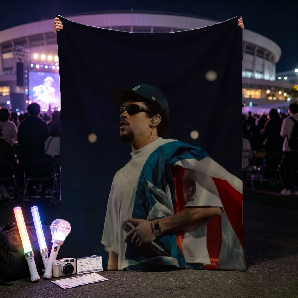 Bad Bunny Performing on Stage with Puerto Rican Flag Draped Over Shoulders - Blankets