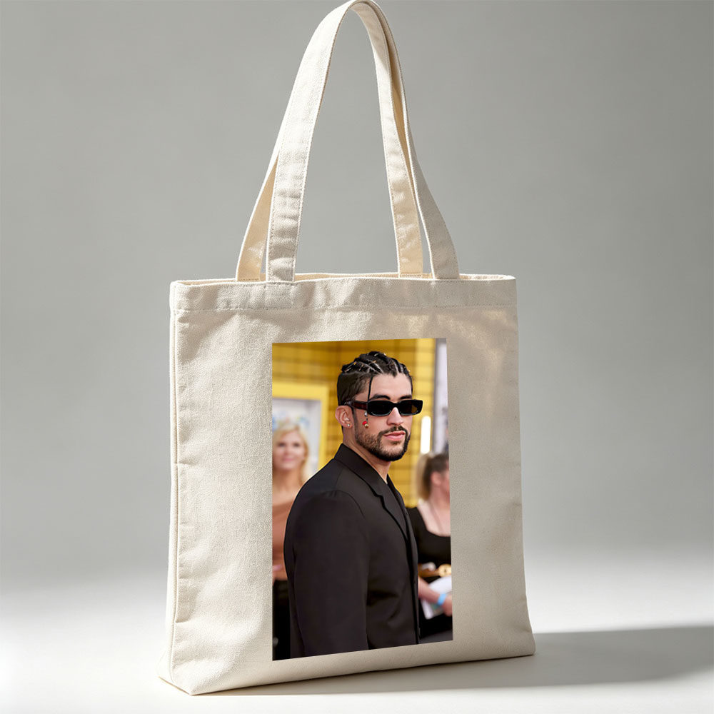 Bad Bunny at the Red Carpet Event Wearing a Black Suit and Sunglasses - Canvas tote bags