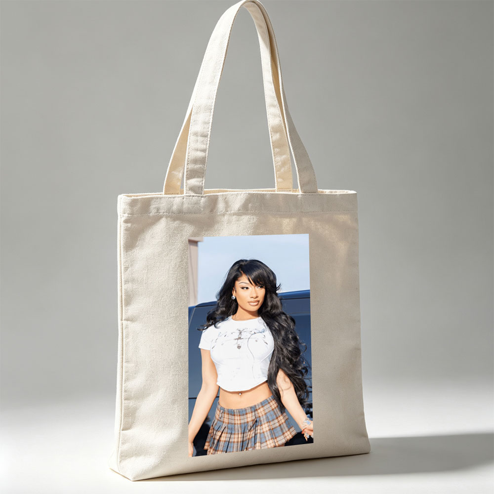 Cardi B in a Stylish Outfit with White Crop Top and Plaid Skirt Standing by a Car - Canvas tote bags