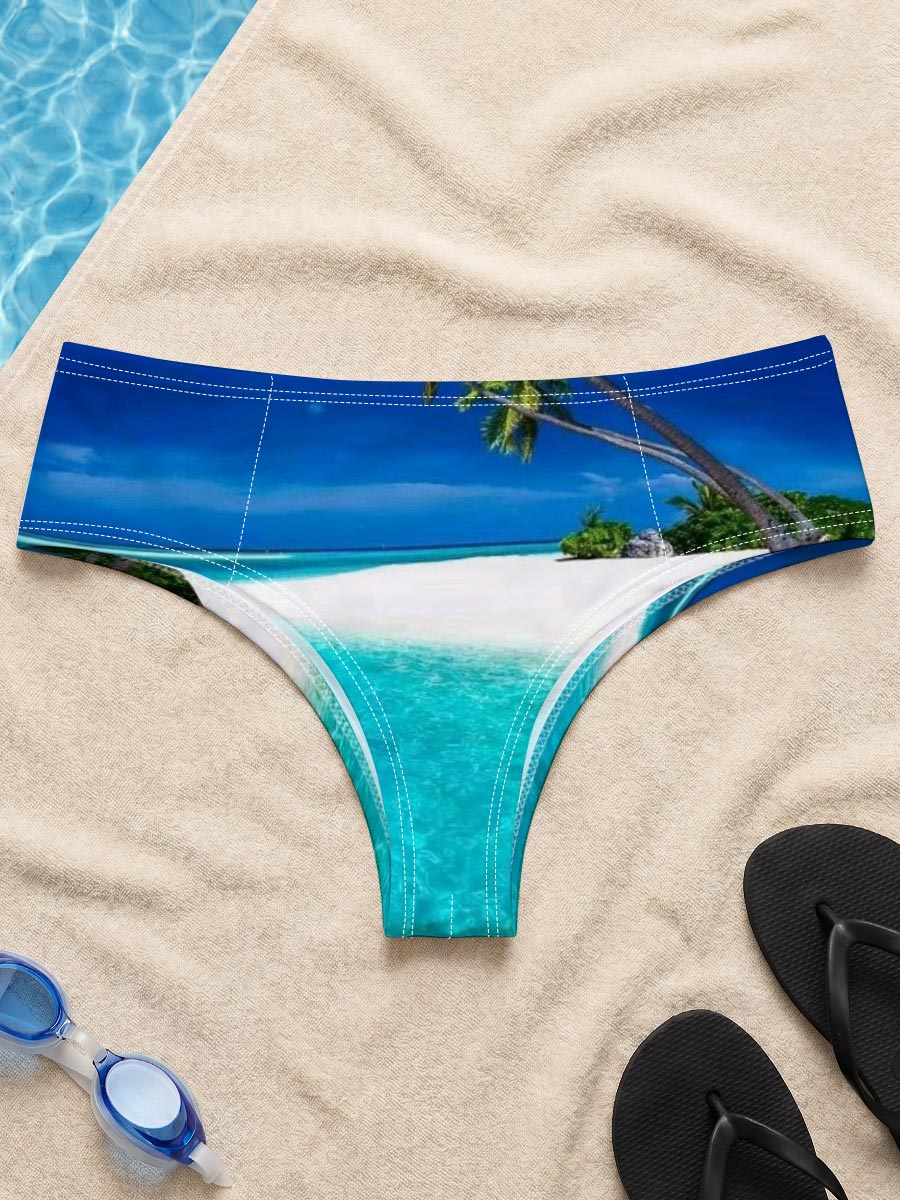 Serene tropical beach with crystal clear turquoise water and leaning palm trees under a vibrant blue sky. -  Men's swim trunks