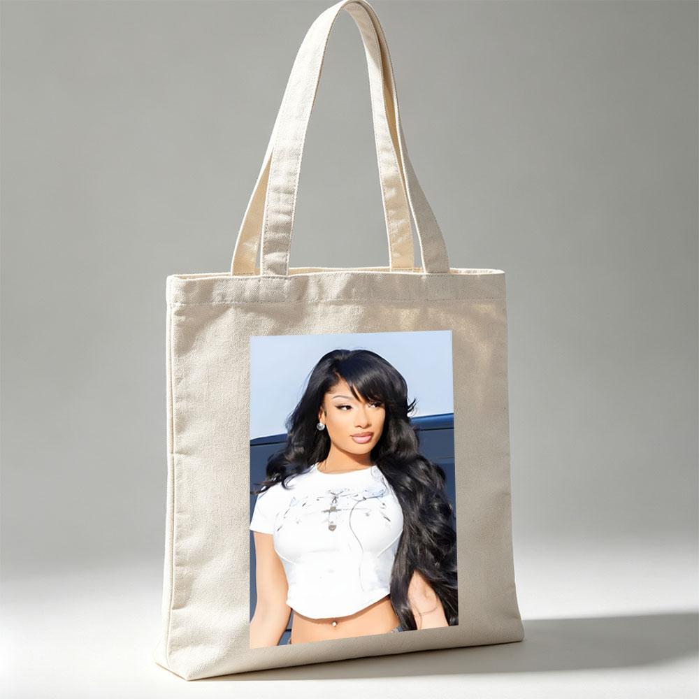 Nicki Minaj in a Stylish White Crop Top with Long Black Hair and Bold Makeup - Canvas tote bags