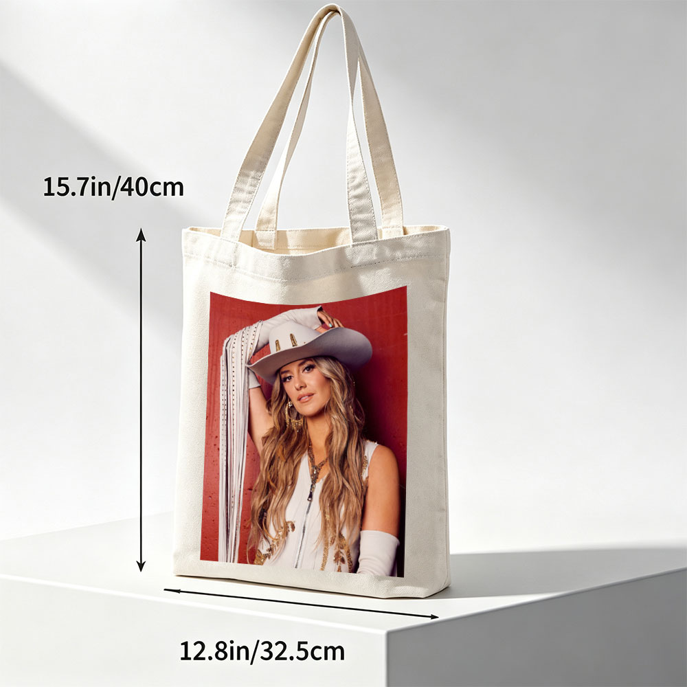 Lindsay Ell in a Cowboy Hat and Western Outfit Against a Red Background - Canvas tote bags