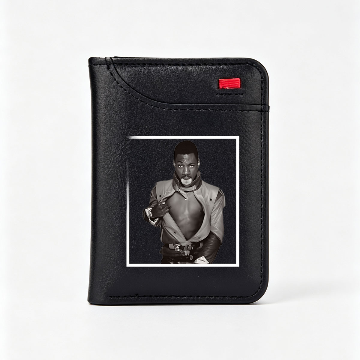 Eddie Murphy in a bold, edgy leather outfit with a dramatic pose - Vertical Style Wallet
