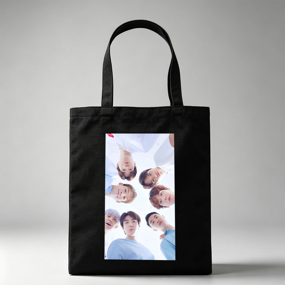 NCT Dream Members in a Circular Formation Wearing Light Blue Outfits Against a Bright Sky Background - Canvas tote bags