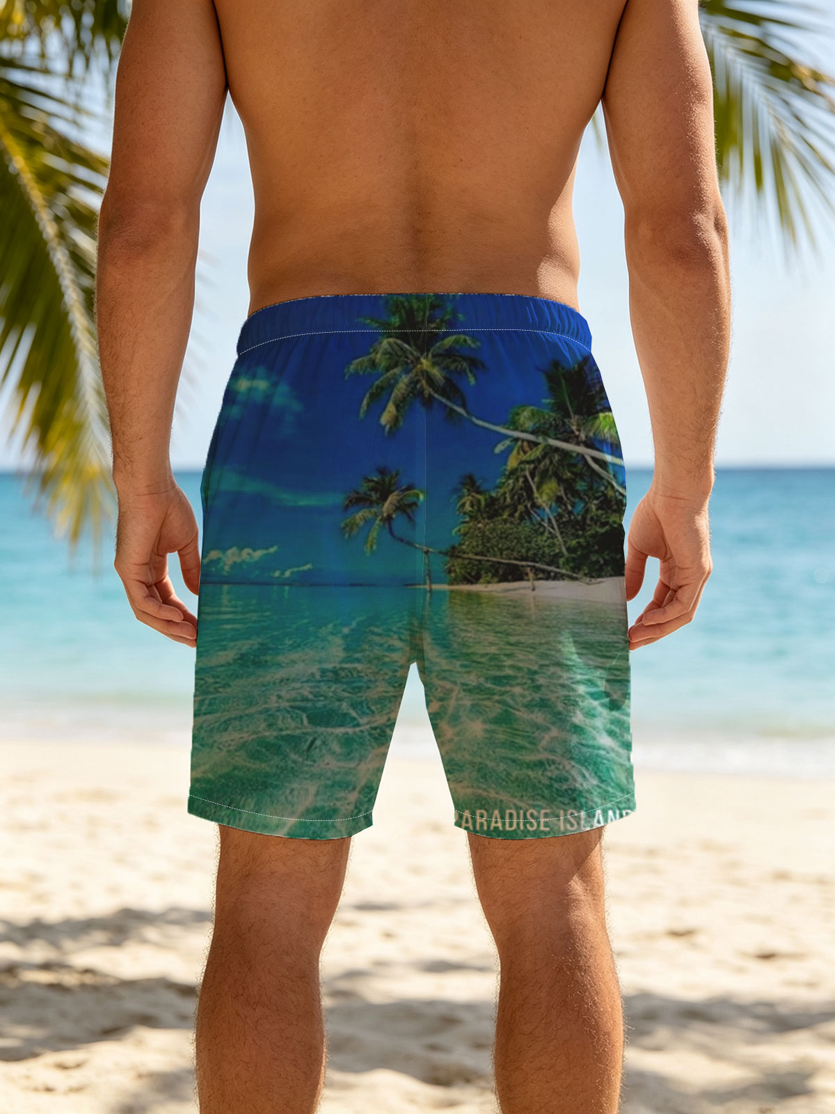 Crystal clear waters and swaying palms on a tropical paradise island under a vibrant blue sky. -  Beach shorts