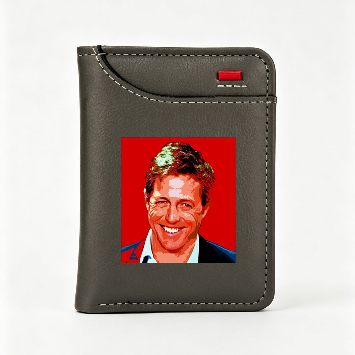 Hugh Grant in a vibrant, stylized portrait with bold red background and pop art effect. - Vertical Style Wallet