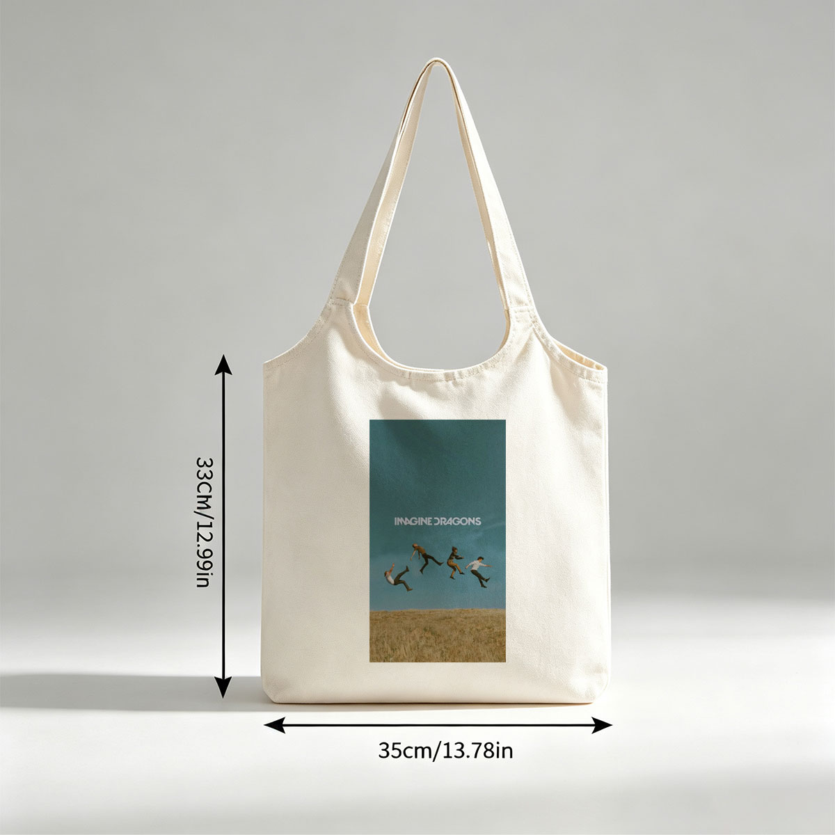 Imagine Dragons Band Members Jumping in a Field Under Blue Sky - Canvas shoulder bags/