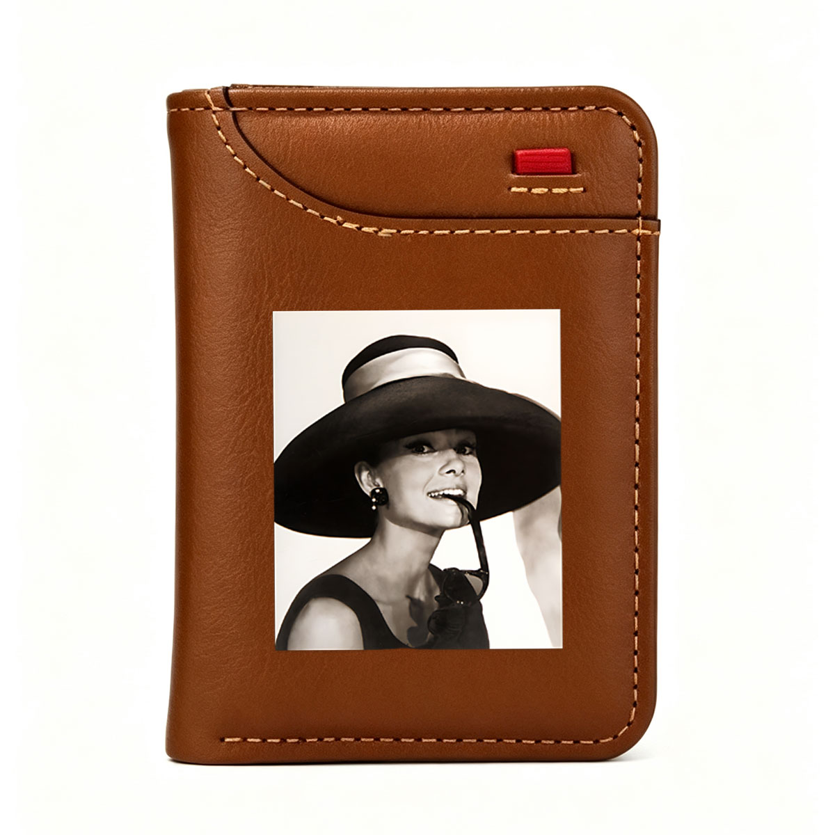 Audrey Hepburn in a wide-brimmed hat and sunglasses, exuding elegance and charm. - Vertical Style Wallet
