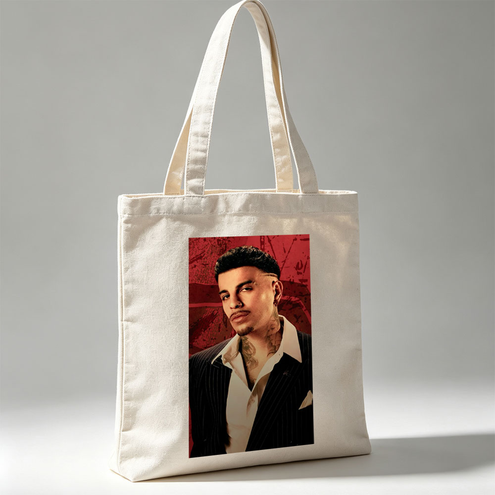 Bad Bunny in a Sharp Suit with Visible Neck Tattoos Against a Red Grunge Background - Canvas tote bags