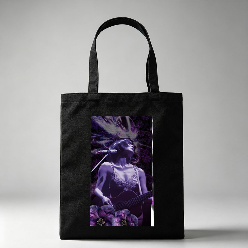 Bj?rk Performing with Guitar in Purple Floral Scene - Canvas tote bags