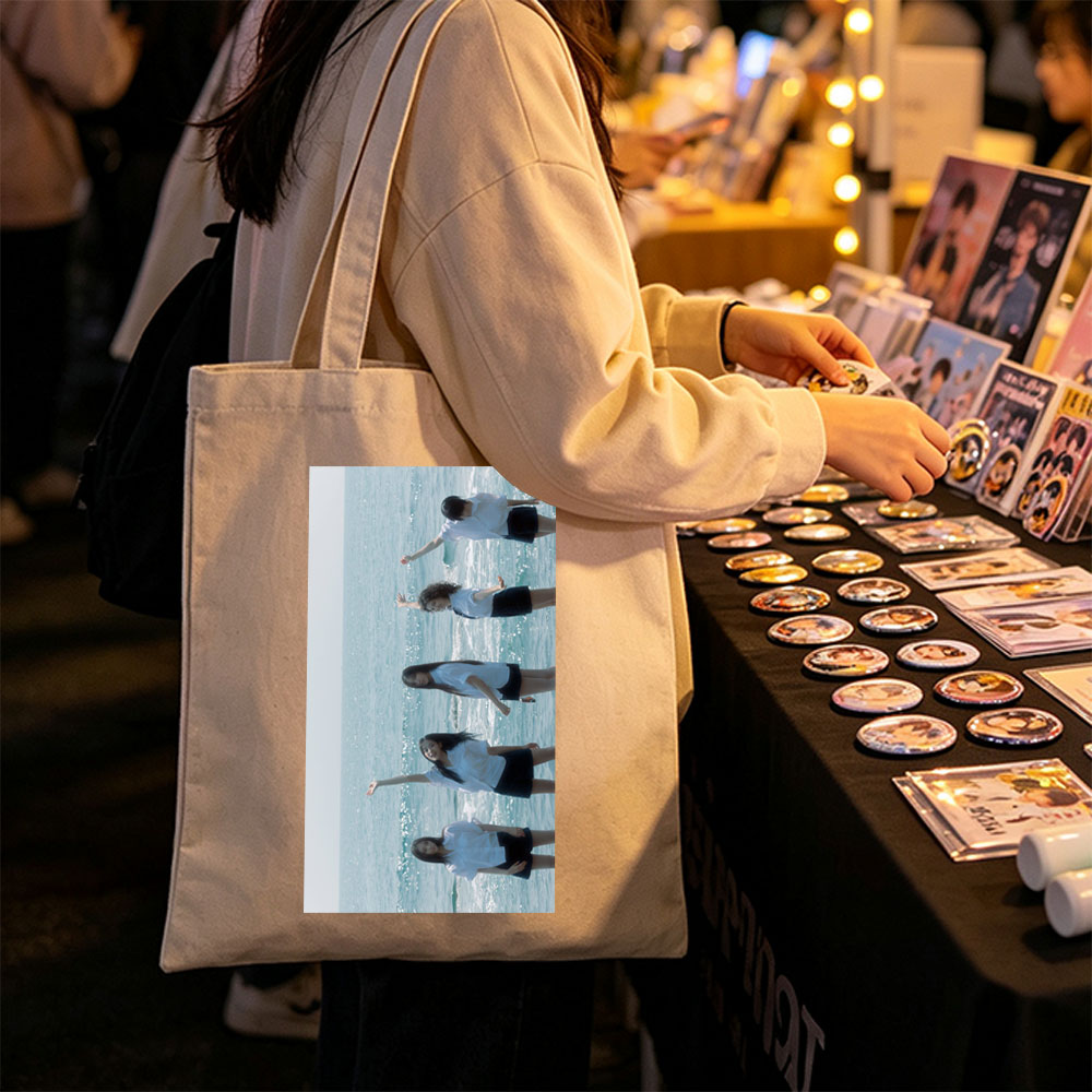 NewJeans Standing in Ocean Waves Wearing White Shirts and Black Skirts - Canvas tote bags