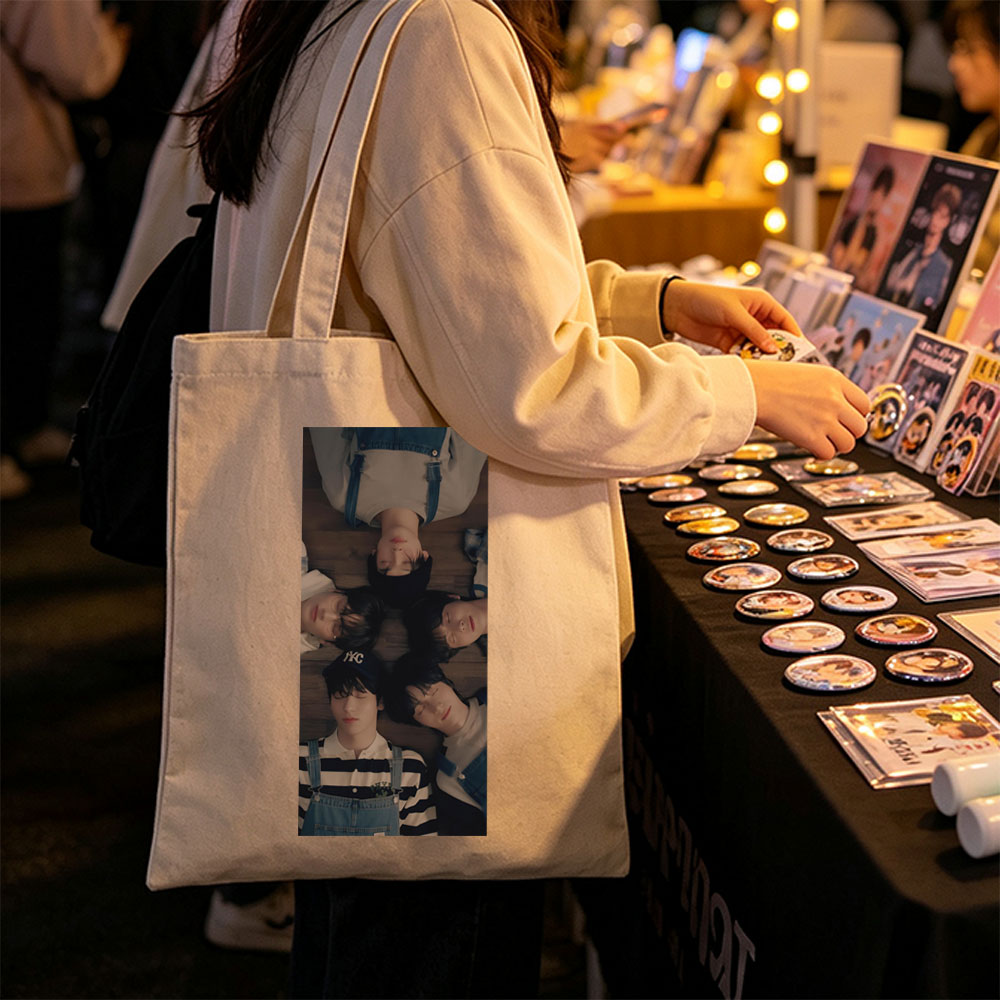 TXT Members Lying in a Circle on Wooden Floor Wearing Overalls and Casual Outfits - Canvas tote bags