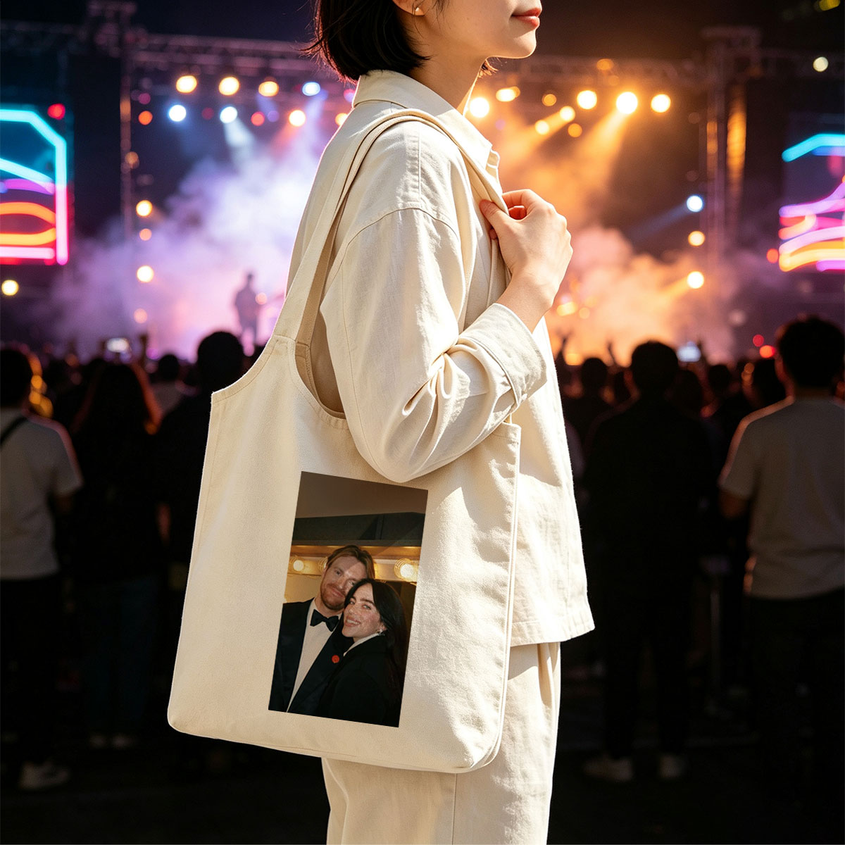 Lily Collins and Sam Claflin at a glamorous event, smiling together in formal attire with warm lighting in the background. - Canvas shoulder bags/