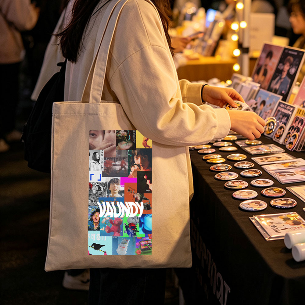 VAUNDY in a vibrant collage of artistic scenes featuring expressive faces, colorful imagery, and dynamic visuals - Canvas tote bags
