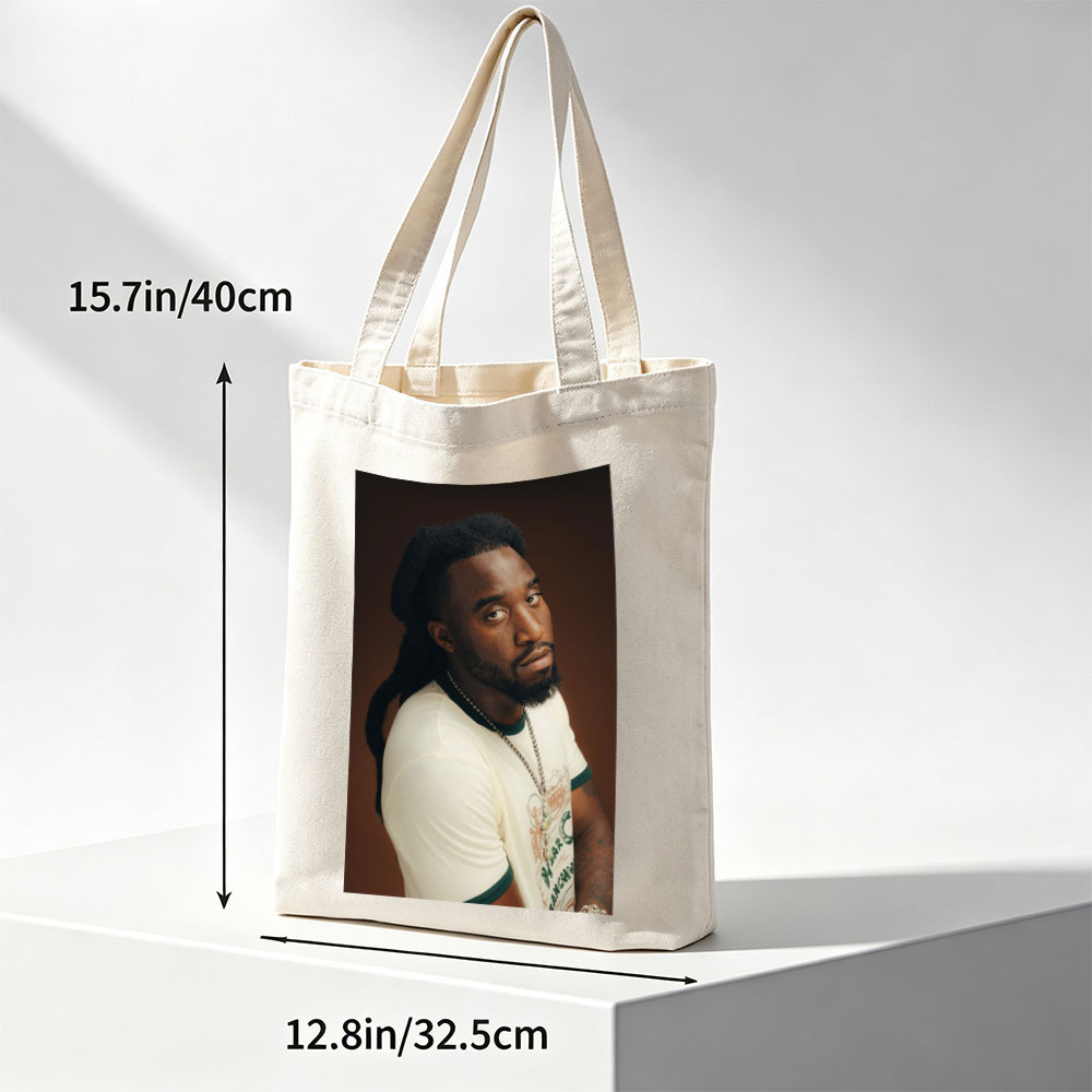 Burna Boy in a Stylish Portrait Wearing a White T-Shirt and Beaded Necklace - Canvas tote bags