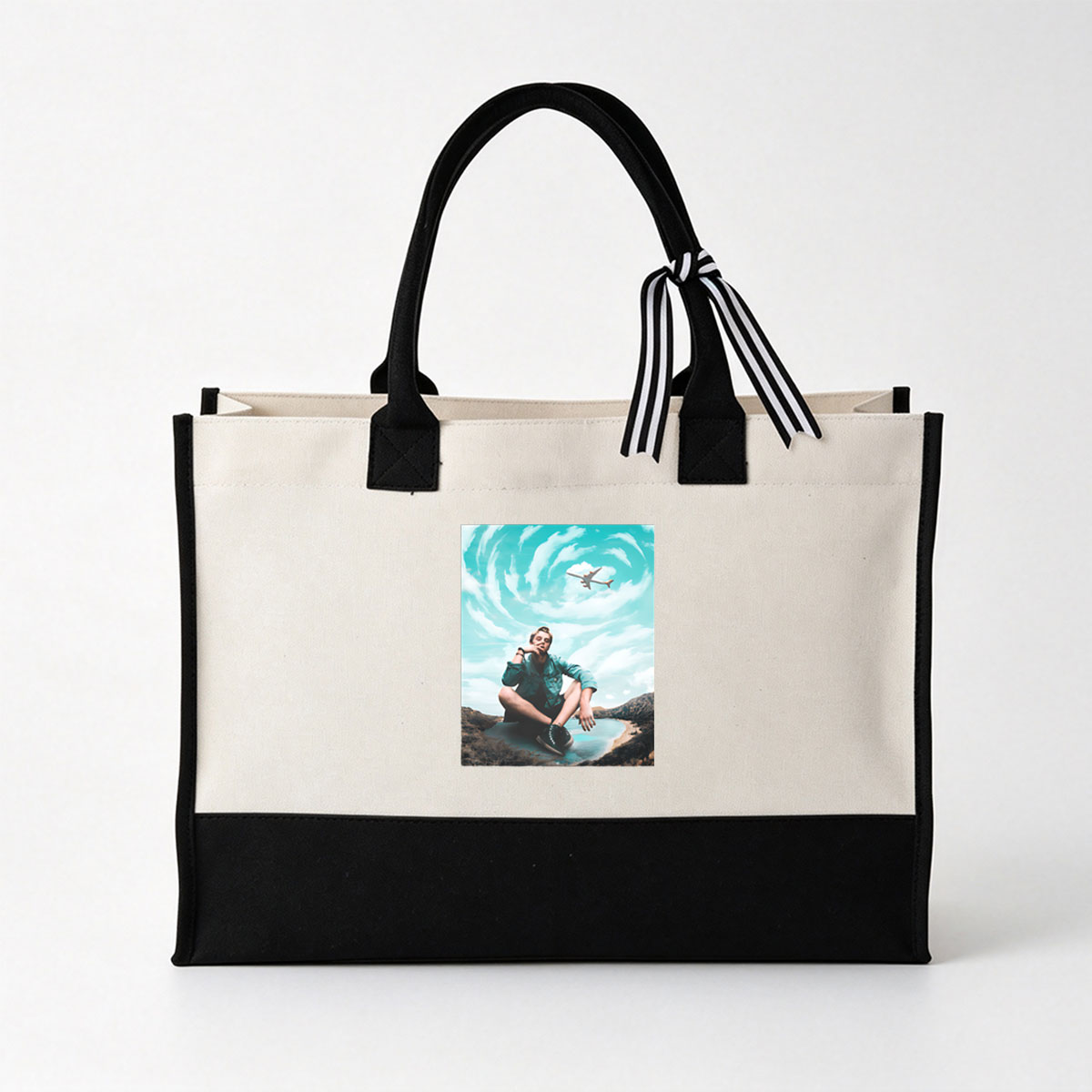 Man Sitting by Lake with Plane in Swirling Sky - Canvas patchwork gift tote bag