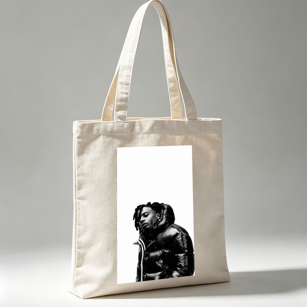 Lil Durk in a Bold Black Puffer Jacket Against a Stark White Background - Canvas tote bags
