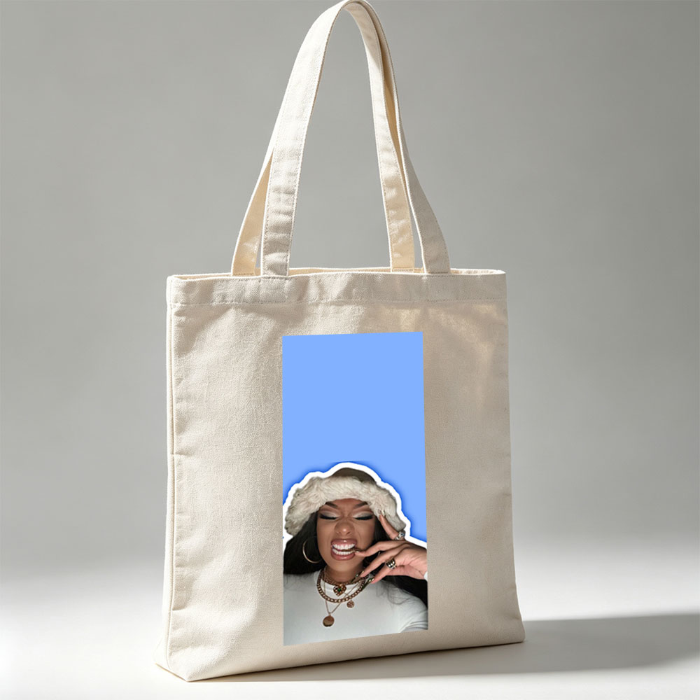 Doja Cat in Festive Mood Wearing Fur Hat and Gold Jewelry Against Blue Background - Canvas tote bags