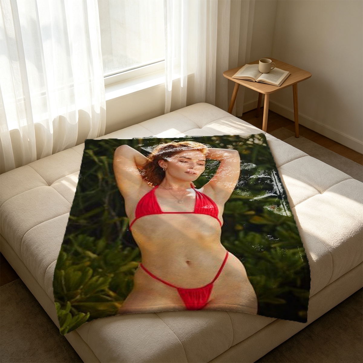 A Japanese woman in an unbuttoned white lace robe lying seductively on a red leather couch. - Blanket