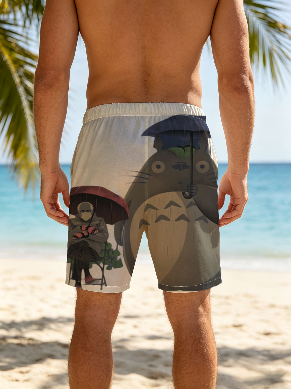 Totoro and a Person Under Umbrellas in the Rain -  Beach shorts